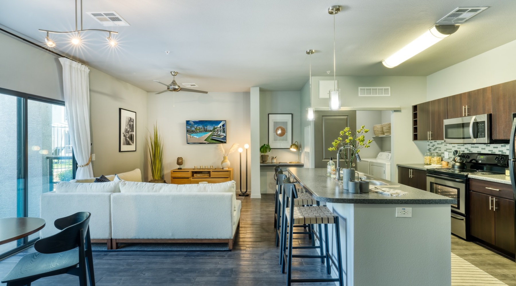 living room and kitchen with bar stool seating