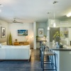 living room and kitchen with bar stool seating