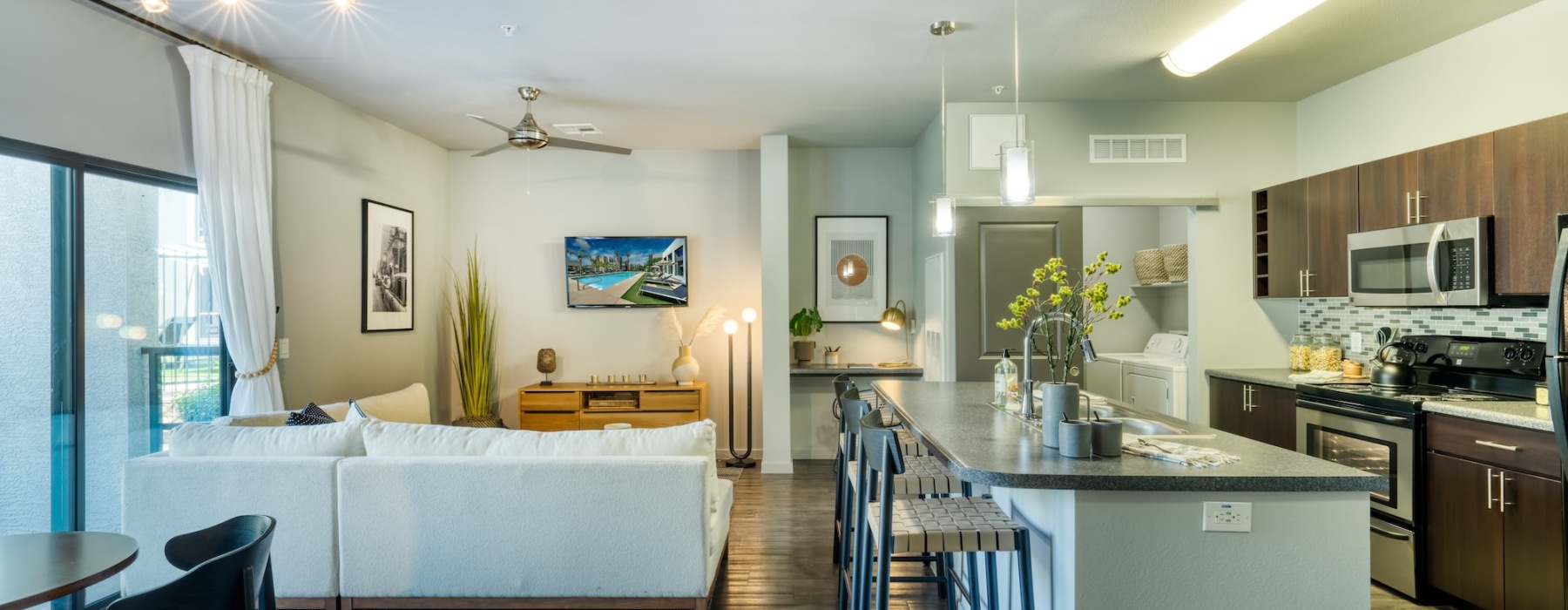 living room and kitchen with bar stool seating