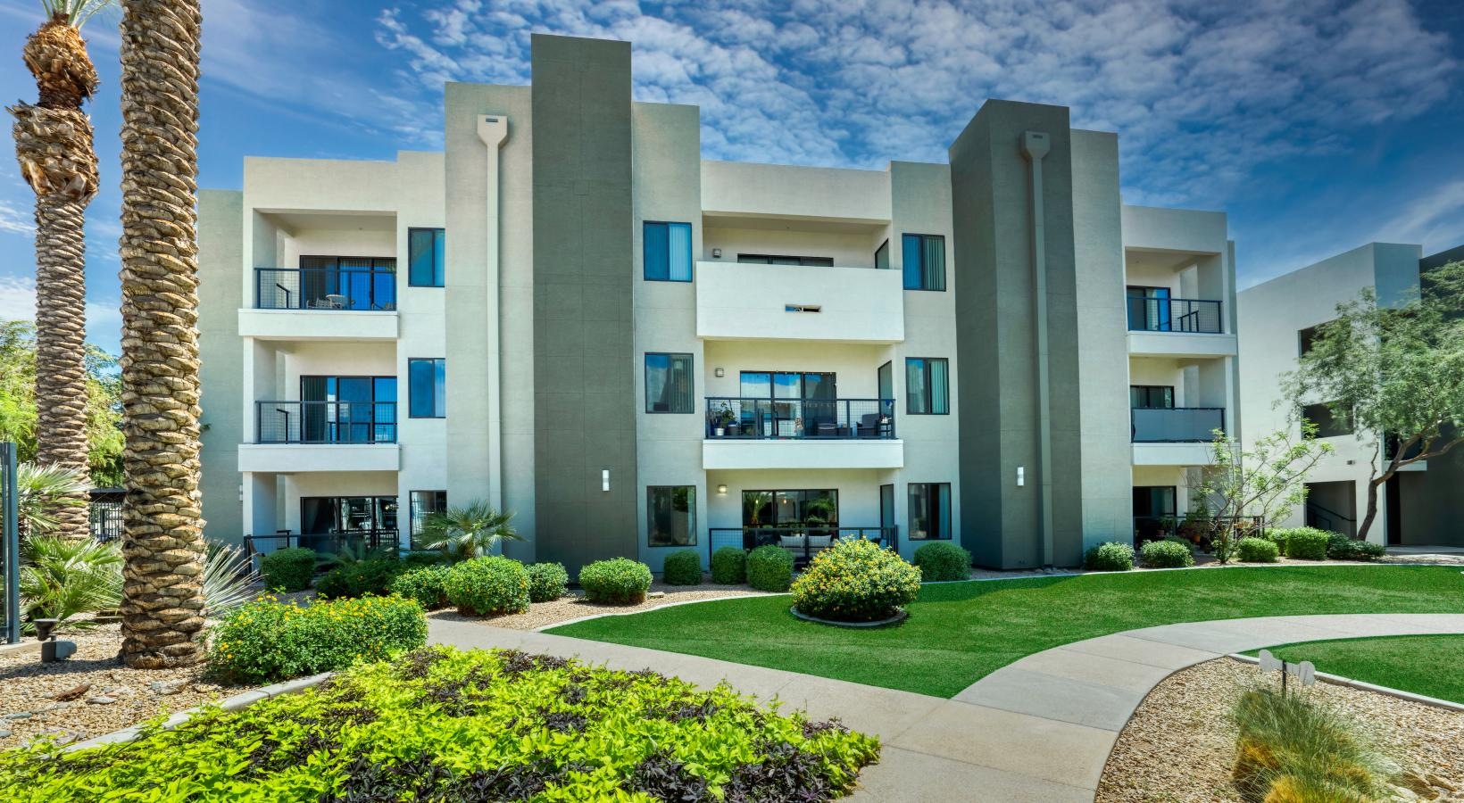 Settle into comfort at Seven a building with a large front yard