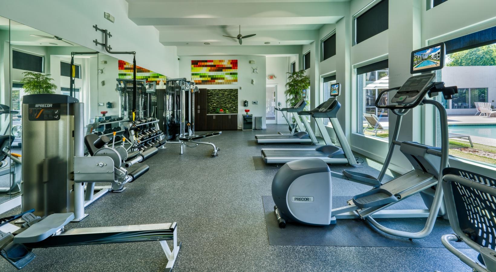 Quick access to state-of-the-art amenities a gym with treadmills